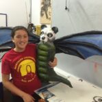 Renee with her papier-mâché art sculpture.