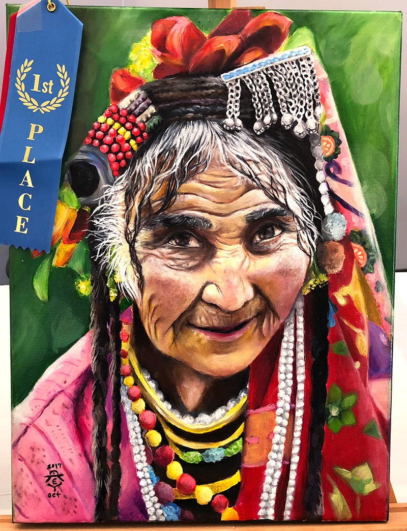 Enya Deng, Student of Oam Studios Art Academy art student, painted a wonderfully calming painting of a smiling woman at our Pleasanton art studio.